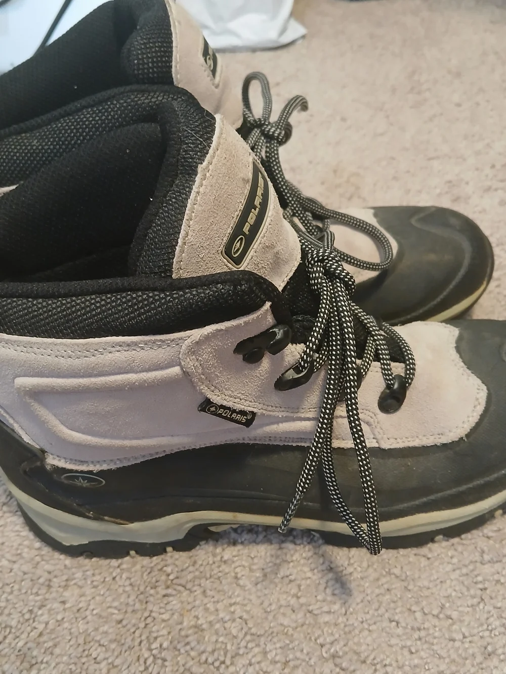 Polaris Thermolite hiking boots feature a gray suede upper with a blk rubber Sol